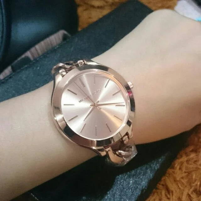 Michael Kors  MK3223 Montre Runway Maillons acier or rose pour femme